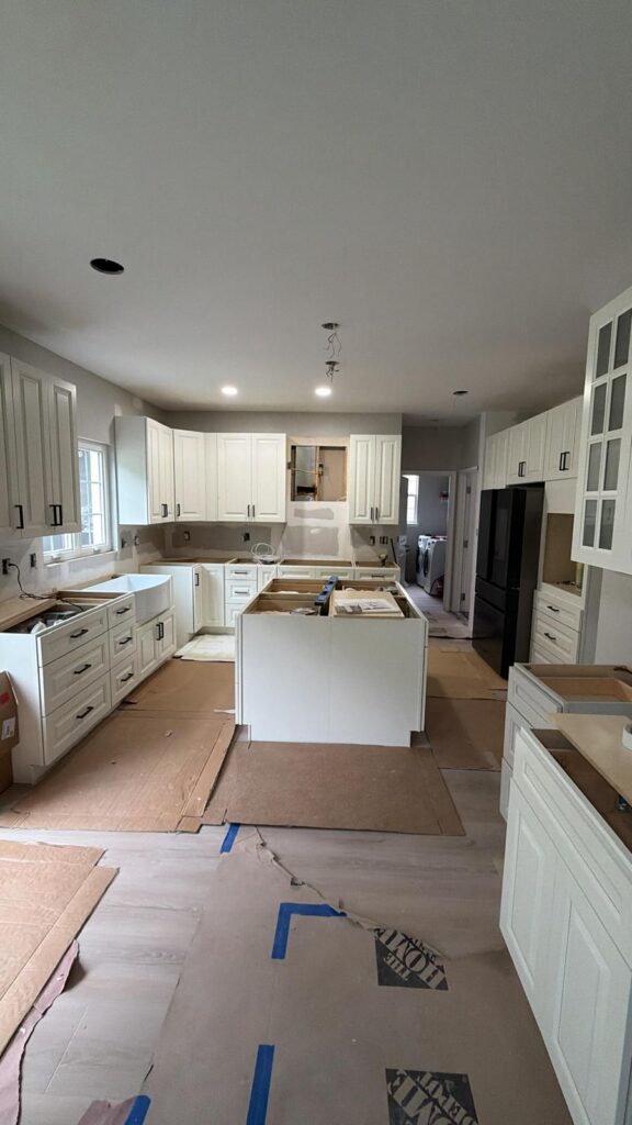 Kitchen cabinets installed, before countertop