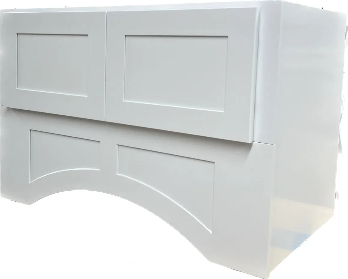 Custom framed cabinet work with shaker doors and a curved valance